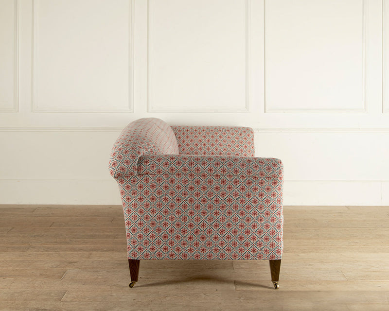 The Mayfair sofa - covered in a floral block print