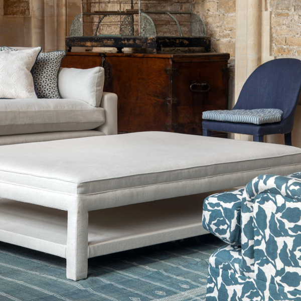 Upholstered ottoman with shelf deals